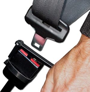 Manette d'ouverture de la ceinture de sécurité.jpg